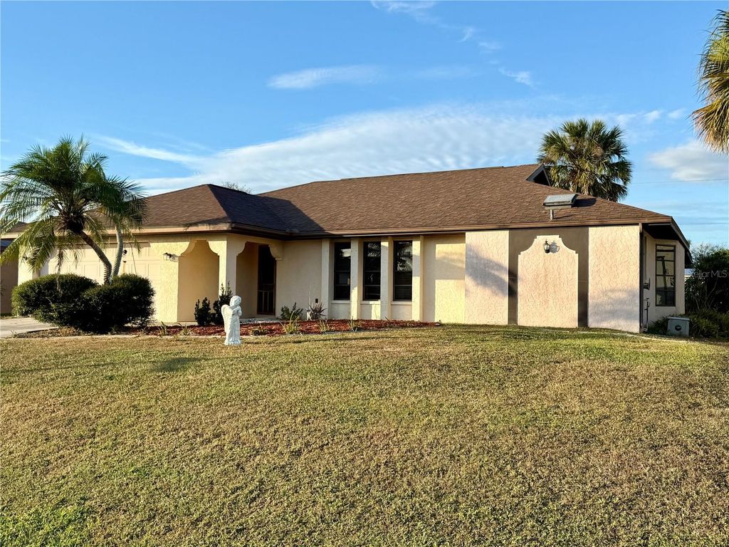 Photo of 21466 Sheldon Avenue, Port Charlotte, FL 33952 (MLS # C7518379)