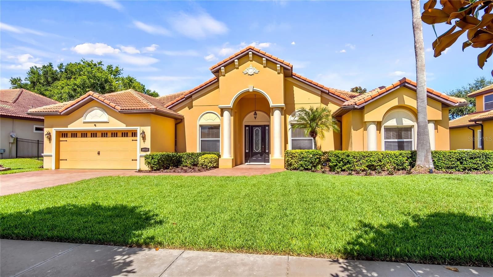 Stunning Former Model Home in Desirable Community
Discover the perfect blend of elegance and comfort in this exceptional four-bedroom, three-and-a-half-bathroom home that showcases the finest in Florida living. This former model home boasts an impressive array of upgrades and thoughtful details that create an atmosphere of luxury throughout.
The heart of this home features a spacious kitchen with gleaming granite counters, updated cabinetry, and premium stainless steel appliances that make entertaining a joy. The breakfast bar and adjoining dinette area provide the perfect spot for casual meals, while the formal dining room offers an elegant setting for special occasions. The expansive family room serves as the ideal gathering space, complemented by a formal living room that would make an excellent den or home office.
Throughout the home, you'll appreciate the beautiful flooring that combines rich wood and elegant tile, creating a seamless flow from room to room. The generously sized primary bedroom offers a true retreat with its luxurious ensuite bathroom featuring a relaxing soaking tub, separate shower, and convenient dual sinks.
Step outside to your own private oasis, where the screened pool and covered lanai create the perfect backdrop for relaxation and entertainment. As evening approaches, you'll be treated to breathtaking sunset hues that paint the sky in brilliant colors above your sparkling pool. The well-landscaped grounds and paver driveway add to the home's impressive curb appeal, while the durable tile roof ensures lasting protection and style.
Located in a charming smaller community complete with sidewalks, this home offers the perfect balance of tranquility and convenience. You'll enjoy being just fifteen minutes from local shopping centers while remaining within an hour's reach of world-class attractions including Disney, Universal Studios, and Orlando International Airport. This exceptional property represents an outstanding opportunity to own a meticulously maintained home in one of the area's most sought-after locations.
