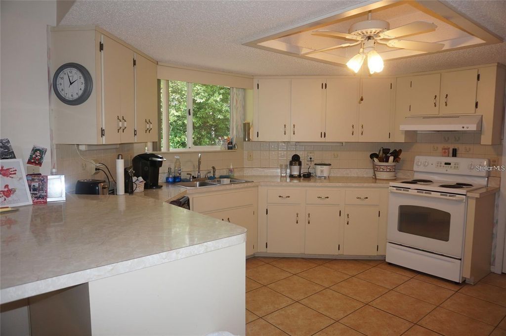 Photo of 10819 SW 83rd Court, Ocala, FL 34481 (MLS # OM722588)