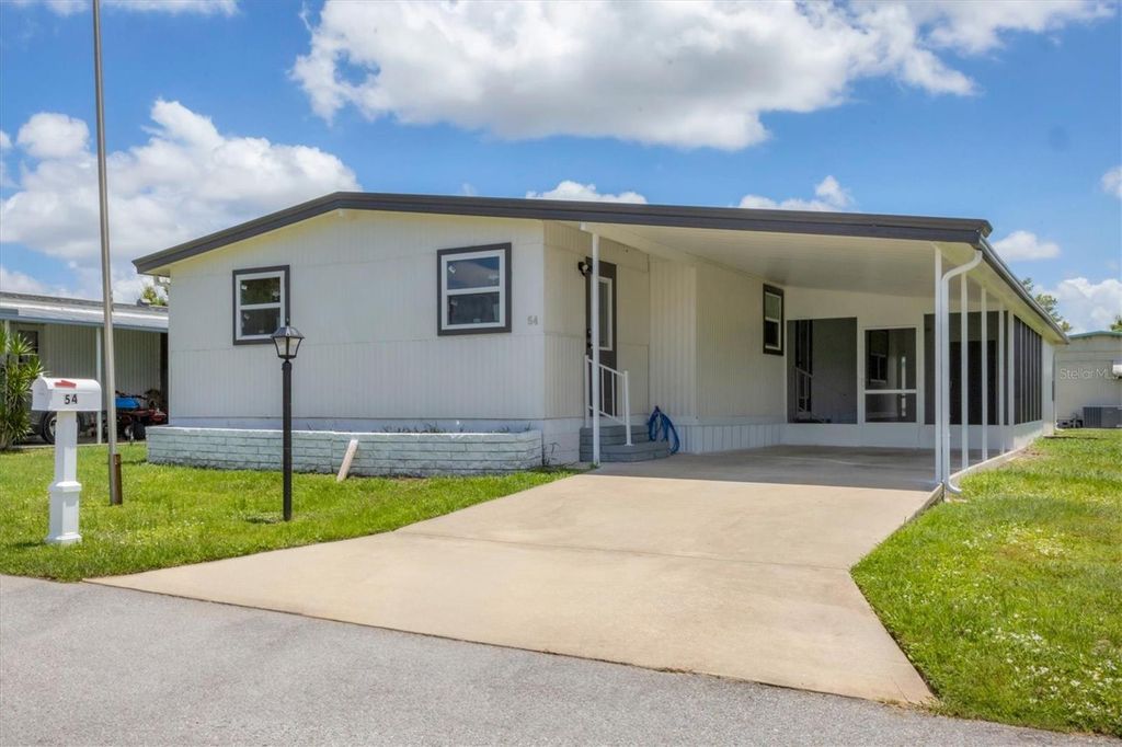 Photo of 6710 36th Avenue E #54, Palmetto, FL 34221 (MLS # A4668831)