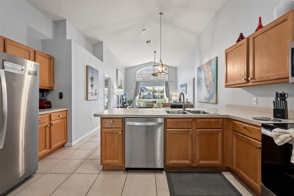 Photo of 948 Lake Berkley Drive, Kissimmee, FL 34746 (MLS # O6418722)