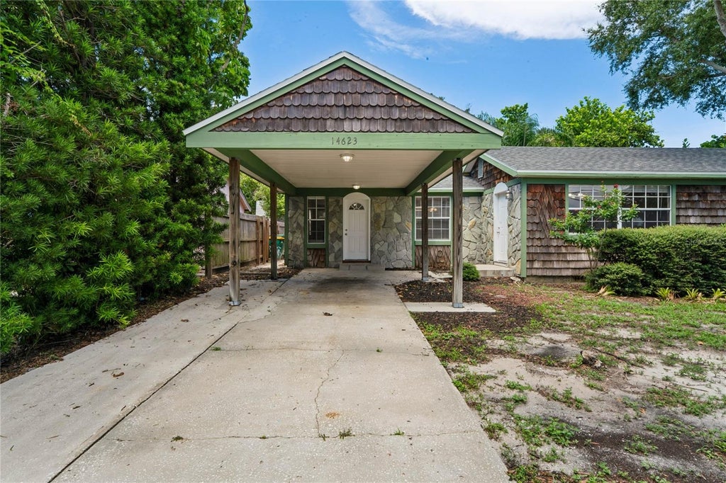 Photo of 14623 Sunset Drive, Largo, FL 33774 (MLS # TB8543007)