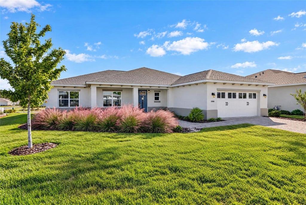Photo of 10886 SW 101st Loop, Ocala, FL 34481 (MLS # OM734855)