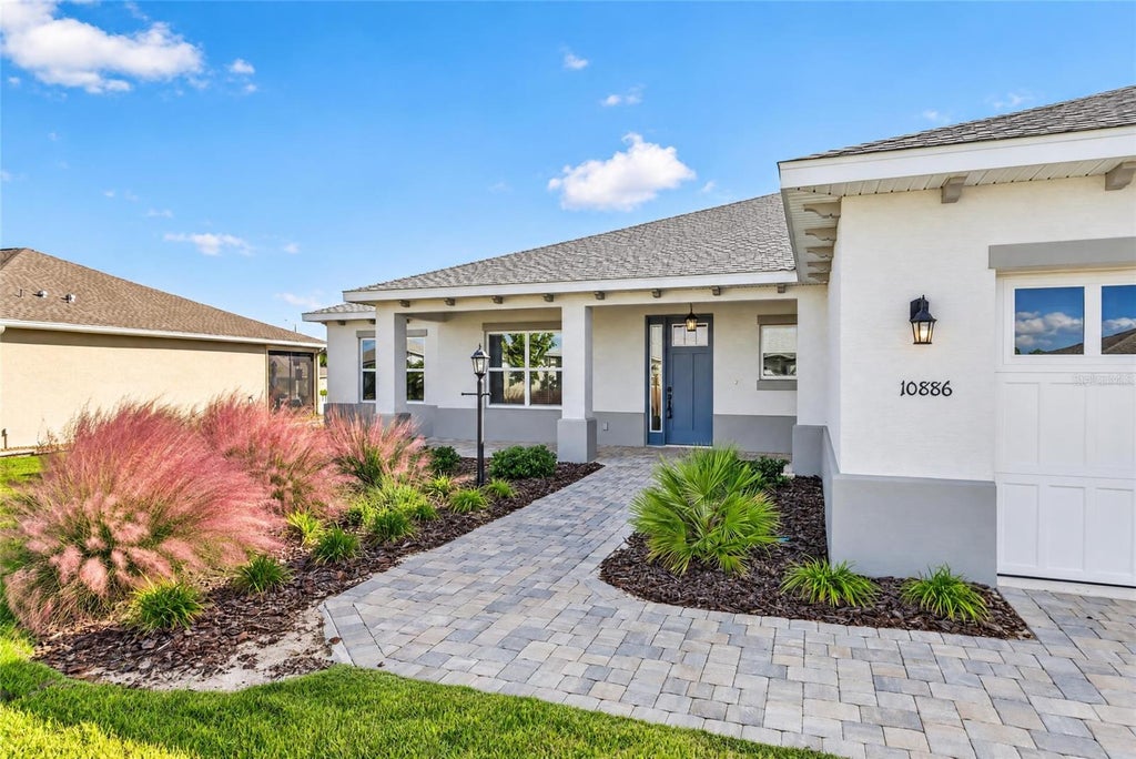 Photo of 10886 SW 101st Loop, Ocala, FL 34481 (MLS # OM734855)