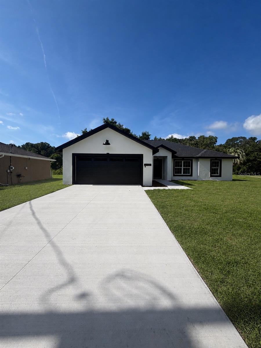 Photo of 2860 SE 146th Place, Summerfield, FL 34491 (MLS # OM729121)
