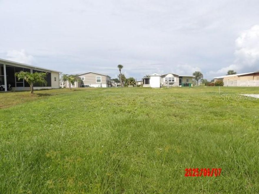 Here you have a great lot in Holiday Mobile Estates 3rd Addition in Englewood, FL. for sale.
There was once a home that is no longer there.  The Seller's are still paying the Englewood Water Bill in order for the new owner's to avoid paying a nearly $15,000 impact fee when you bring in your new custom built home here.
This is a 72' X 110' lot.  There is no lot rent or monthly maintenance fees in this desirable community.
The $35.00 yearly Homeowners association fee is optional.
I have been told that the usual $315. yearly fee to the Active Edgewater Clubhouse is reduced to $87.00 yearly when you don't have your h  At that courtesy price you will have NO Clubhouse privileges.  It just keeps you or your buyer's to avoid the $1000. Buy-in Fee.
If the full fee is paid you will have access to enjoy all the fun at The Edgewater Clubhouse.
This is optional, but you might enjoy The swimming pool, Pickleboard, shuffleboard, Tennis and more outdoor activities.
The Clubhouse has Dinner dances, potlucks, cards, arts and crafts, Themed Holiday get togethers and much more. Pet friendly and golf Carts are Welcome.
Don't miss the chance to enjoy living the Florida Lifestyle in this Adult deed restricted neighborhood.
Lots of Water around, Public Golf Courses and Public Boat Ramps in town.

Being SOLD-AS-Is, subject to buyer's approval.
All Information provided is deemed reliable, but Buyer/Buyer's Agent should verify.