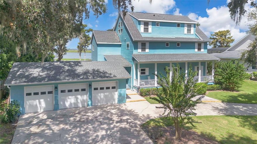 Luxury Lakefront Dream Home with Boat Dock, Pool, Sunset Views, and So Much More. Experience luxury lakefront living in the small gated enclave of Regal Cove on West Lake Toho. This modern 5BR+/3BA/3 Car Garage home seamlessly blends soothing coastal style with modern luxury upgrades throughout. Enjoy entertaining in this spacious open floor plan featuring soaring ceilings, huge gourmet kitchen, large screened patio deck and oversized swimming pool as the sun goes down over the lake. The kitchen boasts sub zero refrigerator and freezer, custom wood floor to ceiling cabinetry, convection oven and cooktop, wine fridge, ice maker and two islands.  The enormous primary suite features a solarium style sitting room with panoramic views of the lake, large walk-in glamorous dressing room, and modern ensuite bathroom with two separate vanity sink areas and large rain shower. This multi-story home features an elevator, as well as an ensuite bedroom on the first level making it easy to navigate with a focus on accessibility. This home is unique in that it has a “basement” level in addition to the 3,864 heated sqft spread over three stories.  In the basement you’ll find a game room, a theater area, and storage area but you can configure it in many different ways.  On the main level, in addition to the entertaining spaces, there is also a bedroom with ensuite bathroom, and another room currently set up as the home office.  On the second floor, you’ll find the primary suite, the laundry room and a loft area. The third floor offers another bathroom, two extra large kingsize bedrooms and a third smaller bedroom, with no closet. This space would be perfect for guests, computer room, office, meditation room, art space, work out room or a variety of creative uses.  The sheer size of this home and the use of open as well as private spaces allow for any potential home buyer to configure the home to reflect their individual lifestyle.  The home is move in ready and waiting for you! The lot is located on the cul de sac of a tree lined street of custom homes and is situated on 0.81 acres with a large west facing lake frontage on the boatable West Lake Toho, a roughly 23,000 acre fresh water lake known for trophy bass fishing and tournaments. The covered powered dock and lift make hopping on your boat for a sunset cruise or a fishing expedition hassle free.  On the property you’ll appreciate the long circular drive, three car garage with one pass through stall, Tesla electric car charging station, the custom half-court basketball court and generous front and rear yards, Schedule today for a private viewing of this rare gem on the Kissimmee Chain of Lakes. Ideally located near the Florida Turnpike, Orlando International Airport, theme parks, NeoCity and Lake Nona Medical City. Home may or may not have surveillance security on the premises. Check out the 3-D virtual tours linked.