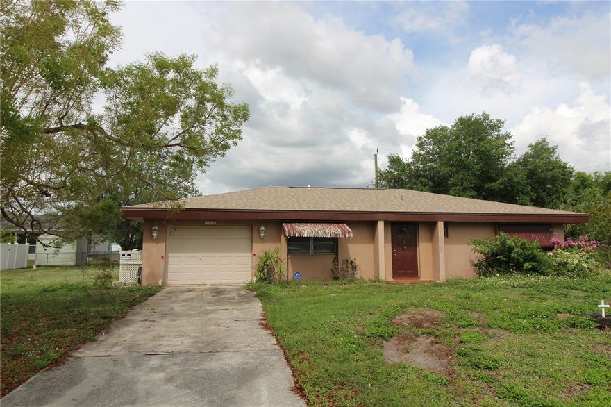 Two Bedroom, two bath, one care garage home in South Punta Gorda.  Needs a little TLC but would be a great starter home, second home or investment rental. No HOA, No Flood Zone
