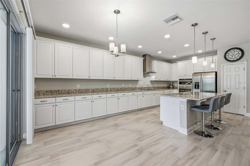 Photo of 12000 Nouveau Avenue, Spring Hill, FL 34610 (MLS # TB8526198)