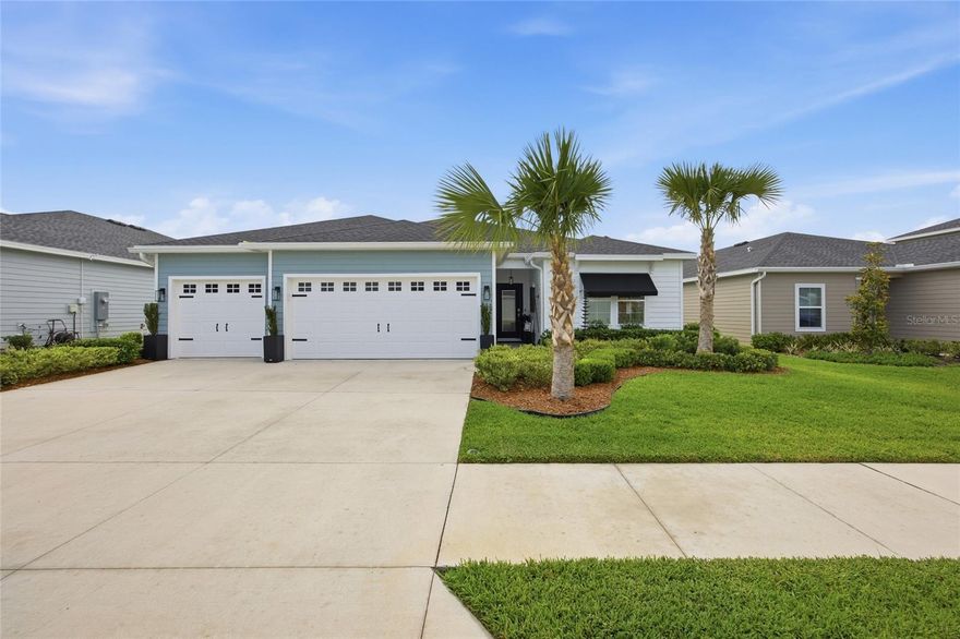 Welcome to an impeccable, better-than-model Princeton II residence where 2024 newer construction meets refined designer upgrades in one of Ocala’s newest and desirable southwest communities. Built in 2024, this stunning 4-bedroom, 3-bath home offers 2,248 heated square feet and 3,126 total square feet of thoughtfully designed living, complete with a finished garage, screened porch, and elegant indoor-outdoor flow. The property is positioned on a prime 7,232 sq. ft. lot with the rare convenience of pool and clubhouse access directly from the backyard gate, creating a resort-style lifestyle just steps from home.

From the moment you arrive, the curb appeal is elevated with palm trees, fresh exterior paint, upgraded landscape and coach lighting, a tiled entrance, new glass front door, keypad garage entry, fencing, and custom awnings on double windows at the front and rear. Inside, the home has been beautifully enhanced with high-end kitchen appliances, black designer hardware, upgraded kitchen faucet, stylish backsplash, under- and over-cabinet lighting, upgraded chandeliers, ceiling fans throughout, and cohesive black doorknobs and hinges for a modern luxury finish.

The owner’s suite feels polished and private with tiled flooring, an enhanced main bath featuring upgraded faucets, shower head, lighting, and framed mirrors, plus a custom double-hanging rod in the main closet. Every detail has been considered, including fresh interior paint, ceiling-height drapery rods and draperies, bamboo blinds in the lanai, and designer lighting in the dining room, breakfast room, and over the island. This home delivers the ease of new construction with the elevated finishes buyers wish were already included.

Located in Ocala, the Horse Capital of the World, this move-in-ready home offers the perfect combination of modern comfort, low-maintenance living, and community convenience near shopping, dining, medical services, major roadways, and Southwest Ocala amenities. A 10-year whole-house warranty adds peace of mind, while the home’s tasteful upgrades and prime lot placement make it a standout opportunity for buyers seeking a polished, nearly new home without waiting to build.