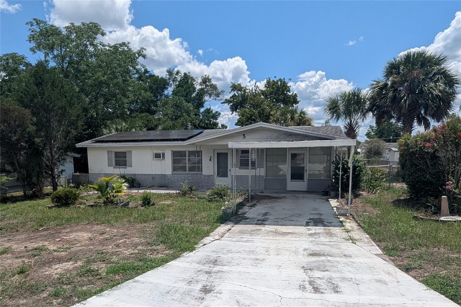 Probate Sale. Cash or conventional financing only. Sold As-Is, no repairs will be made. Cozy 1 bedroom, 1 bathroom, concrete block home on a .21-acre lot. Original terrazzo flooring throughout. Concrete block shed in backyard. Great opportunity for a handy homeowner. Home is priced to reflect updating needed. New roof and electric panel 2015. Solar PV system 2022, will be paid off by seller at closing. Please allow 45 days for closing. Located close to local dining, shopping, state forest, springs, and Gulf Coast.