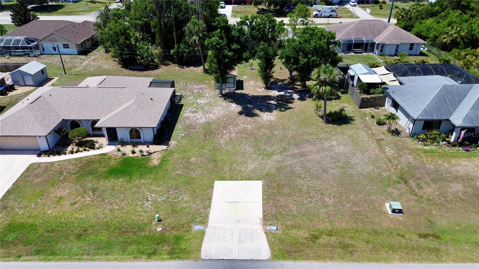 Discover this fantastic opportunity to build your dream home or investment property on a spacious .23 acre lot in North Port. Located in a highly desirable area, this lot offers the perfect blend of convenience and freedom with no deed restrictions. Situated close to shopping centers, restaurants, and essential amenities, this lot provides easy access to I-75 & US 41 for effortless commuting. Whether you're looking to settle in a growing community or secure a valuable piece of land for future plans, this property is an excellent choice. Don't miss out on this versatile lot in a prime North Port location. Contact us today for more details or to schedule a visit!