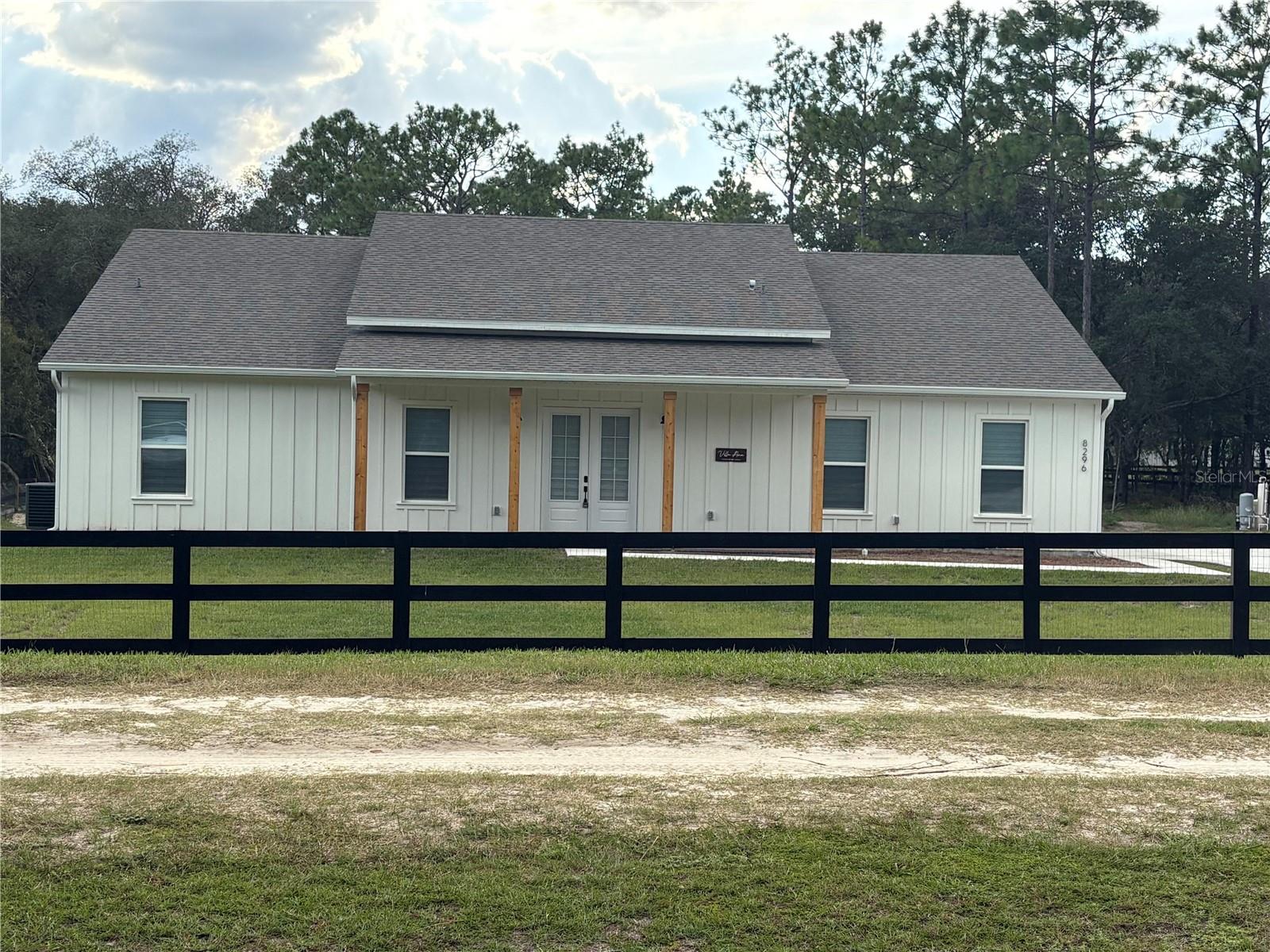 BEAUTIFUL FARM HOME WITH 4 BEDROOMS, 2.5 BATHS, EXTERIOR FRONT & REAR OPEN CORRIDORS ON PAVERS FLOORING, CEDAR WOOD COLUMNS, COVERED FULL EQUIPPED SUMMER KITCHEN, FIRE PIT, NEXT DOOR LOT IS A DRY POND WITH A GREAT VIEW AND A LOT OF PRIVACY. COMPLETE AIRBNB FURNISHED PACKAGE IS MANDATORY FOR ADDITIONAL $45K. SHOWINGS BY APPOINTMENT ONLY.