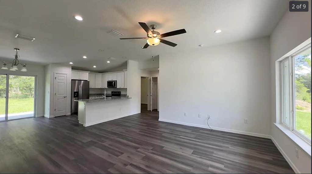 Photo of 122 Malauka Loop, Ocklawaha, FL 32179 (MLS # O6413521)