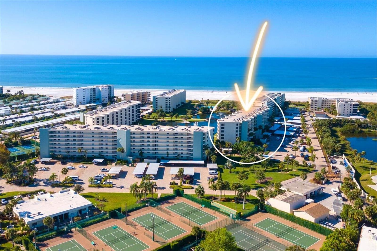 Listing reflects off-season rate. Available peak season months: March 2026, April 2026. Introducing your dream beachfront getaway in Siesta Key, Florida or as we like to call it... 2 Tickets to Paradise! This stunning 2-bedroom, 2-bathroom beachfront condo offers the perfect blend of luxury and relaxation. With direct beach access and tranquil views of the garden and ocean, it's the perfect spot to unwind. Step inside to discover a large kitchen, ideal for preparing meals and entertaining. The primary suite offers complete relaxation with a comfortable king-sized bed, a cozy spot to read a good book, and a large ensuite bathroom with a walk-in shower. Up to bringing friends or family? There's plenty of room in the guest bedroom, offering two double beds and their own access to the guest bathroom. Did we mention paradise includes your own wet bar and wine fridge!? Pour yourself a drink of your choice, walk over to watch the exquisite sunsets in the enclosed patio, and don't forget to open the sliding glass windows to let the cool ocean breeze in! Enjoy Gulf & Bay’s impressive amenities including 3 heated pools, 8 tennis courts, a fitness center, BBQ areas, and private access to Siesta Key Beach! You've waited so long, and now the wait is over, you've got 2 tickets to paradise!