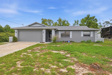 Photo of 6310 Gainsboro Avenue, Spring Hill, FL 34609 (MLS # W7888029)
