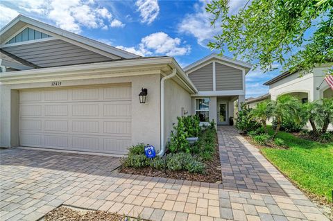Photo of 12419 Oak Hill Way, Parrish, FL 34219 (MLS # A4689909)