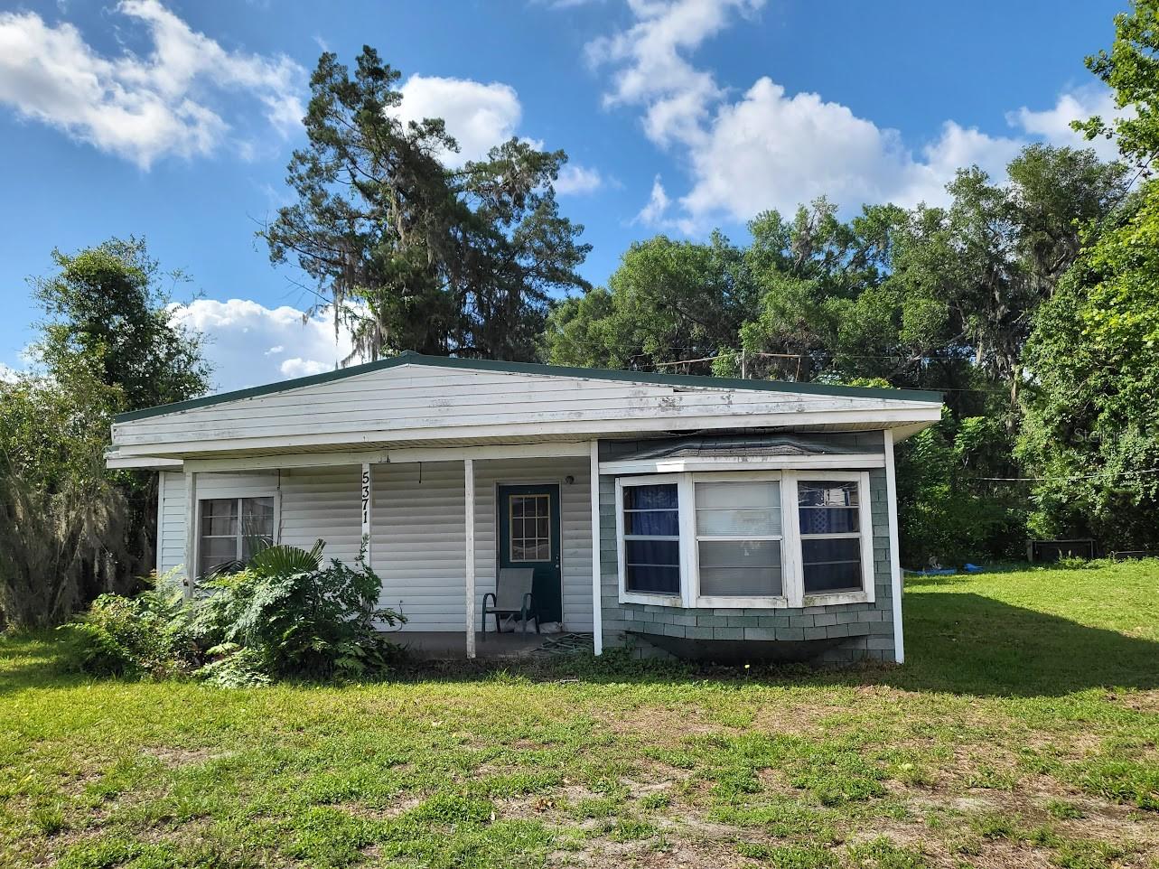 PRIME PROPERTY in the middle of the Villages of Fenney. 2 Parcels included in this sale. All new offices and medical centers going up here on Warm Springs Ave. Minutes from shopping, restaurants, The Turnpike, SR 301, CR 44 and The Villages are all around. One of the last pieces on this strip. Sewer coming, city water. Open your own office or shop here. The neighborhood is within the city and zoned NMU-4, the subject can be annexed and rezoned. Better Hurry!