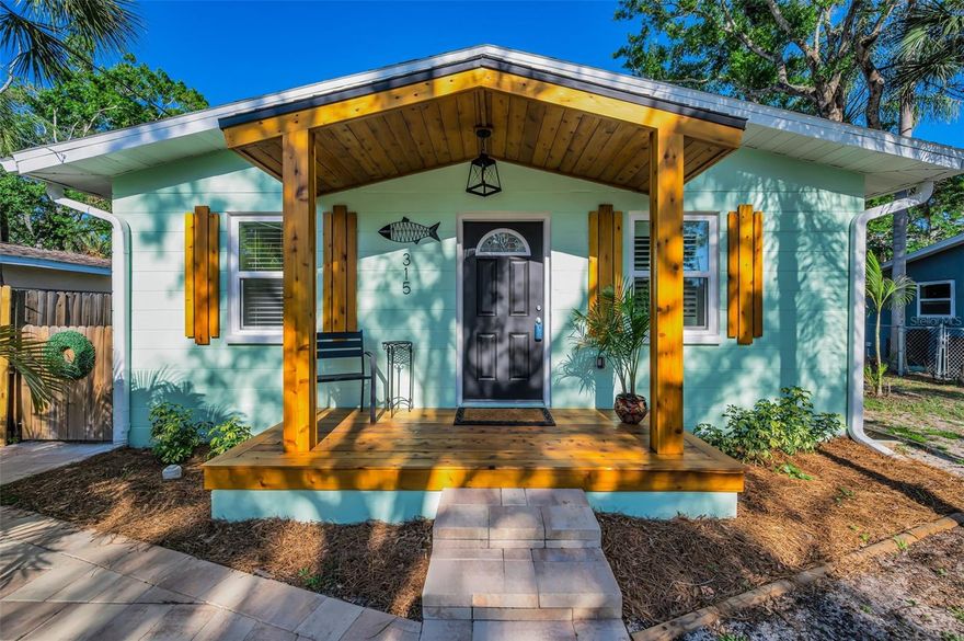 This is the one OPPORTUNITY buyers and investors look for but rarely find — a fully renovated turn-key home PLUS a separate income-producing ADU, all in one of Tarpon Springs’ most sought-after locations. With the rear ADU already leased for $950/mo and just two blocks from downtown and minutes from the Sponge Docks, this property offers the INCOME, location, and built-in upside that attracts immediate attention.

Whether someone wants a true live-in-one, rent-the-other setup or a two-unit investment play, the appeal is obvious — and so is the scarcity. The main home is a beautifully and completely renovated 2-bedroom, 1-bath residence featuring a fully remodeled kitchen with quartz countertops, new stainless steel appliances, renovated bathroom, new flooring, fresh interior & exterior paint, plantation shutters, insulated windows, LED lighting, crown molding, new insulation, a tankless water heater, updated electrical, new AC system, gutters and new fencing etc etc. Combined with the 2019 roof, these improvements means the heavy lifting has already been done.

Add in the fenced backyard, HUGE covered paver patio, fire pit area all perfect for entertaining. Add to that it's close proximity to restaurants, shops, and local attractions in Downtown Tarpon, this is a rare offering with both lifestyle appeal and income potential. Just two blocks from charming downtown Tarpon Springs and only one mile from the world-famous Sponge Docks, this location puts restaurants, shops, waterfront attractions, and local culture practically at your doorstep. Buyers will love the ability to enjoy the character and energy of Tarpon Springs while still having quick access to one of its most sought after destinations.