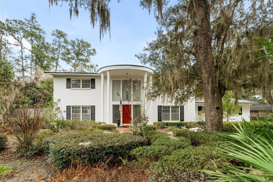 Pool homes in Northwest Gainesville are rare, and this Suburban Heights classic delivers. The curved portico and two-story columns create a striking first impression, leading into a dramatic two-story foyer with floor-to-ceiling windows.

Inside, you’ll find 4 bedrooms and 2.5 baths with a layout that is thoughtful and purpose-driven. Distinct living spaces offer flexibility while still feeling connected and spacious.

Recent updates bring peace of mind, including a new roof (2026), brand-new kitchen (2025), fresh interior paint, blown-in attic insulation (2023), and updated carpet (2024).

Highlights include a formal dining room, original brick fireplace, built-in study off the foyer, and a spacious primary suite with dual sinks and a walk-in closet. Out back, enjoy a private pool with generous patio space for entertaining, framed by beautifully designed low-maintenance landscaping.

If you’ve been waiting for a character-rich Northwest pool home with meaningful upgrades already completed, this is your opportunity. Come experience it in person.