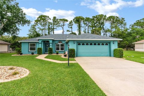 Photo of 825 Wooddusk Drive, Port Orange, FL 32127 (MLS # NS1087924)
