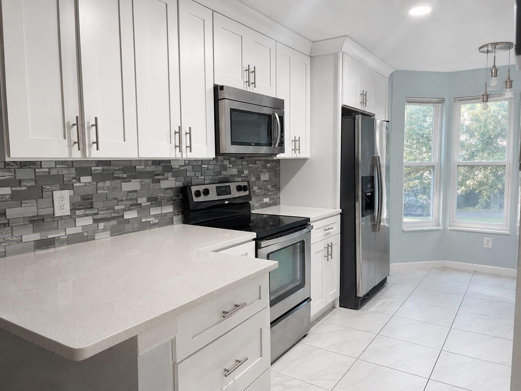 Photo of 7650 Sugar Bend Drive #7650, Orlando, FL 32819 (MLS # S5159829)