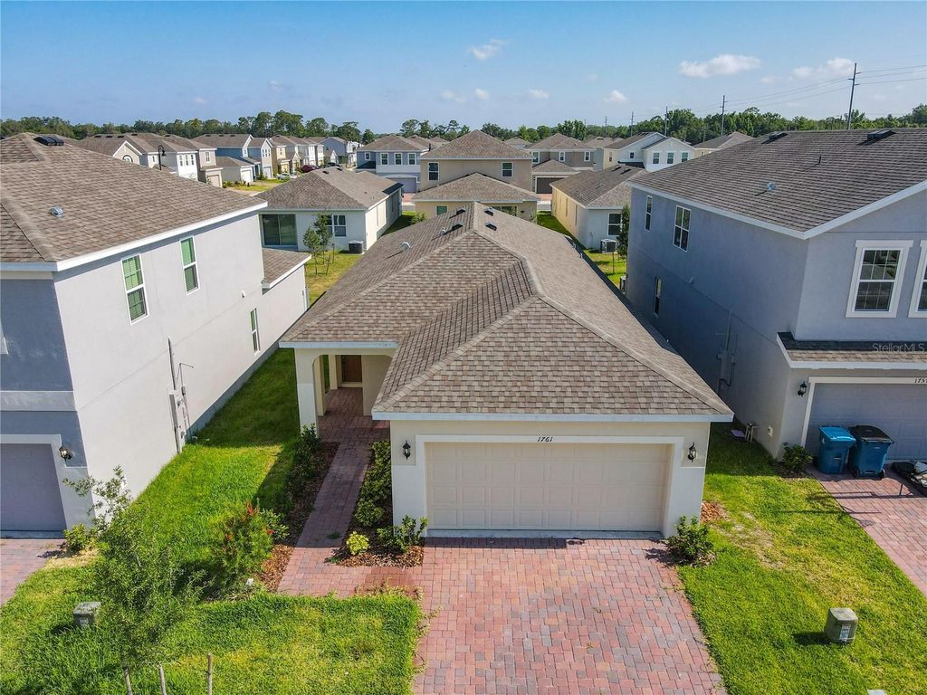 Photo of 1761 Tree Shade Drive, Davenport, FL 33837 (MLS # O6362036)
