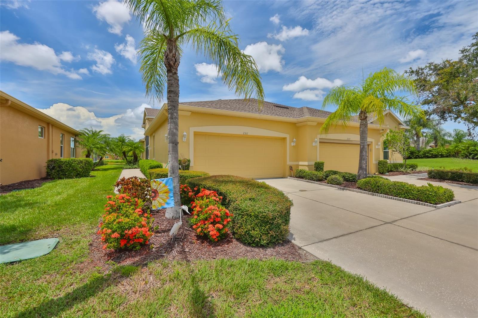 Welcome to your waterfront dream home that sits on a quiet street. Just a quick hop in your golf cart to the Kings Point South Clubhouse with restaurant, bar, pools, hot tub, pickle ball and much more! This lovely Palm model shows it's beauty with tall ceilings throughout. Just entering the home you sense the richness of the home with the front screened area perfect for a bistro set and plantings. Enter through the arched Foyer with recessed lighting and a coat closet! This upscale home has 2 bedrooms, 2 bathrooms, a Florida Room and an office/den. The Chef’s Kitchen has granite counter tops, dual stainless undermount sink, solar tube with night retention, upgraded solid wood 42 inch cabinets, crown moldings and under cabinet lighting which shows off the elegant, tiled backsplash. Kitchen also has recessed lighting, a reverse osmosis system, a breakfast bar and a very efficient square shape with a huge amount of counter space and a closet pantry! All kitchen appliances are stainless with a double convection oven/range, French door refrigerator, dishwasher and convection microwave with outside exhaust too! The Great Room has a ceiling fan, tray ceiling and sliders to the waterfront Florida Room. The Primary Bedroom features a waterfront view, laminate flooring, tray ceiling, ceiling fan, cellular shades, large walk-in closet and an en-suite bathroom. En-suite bathroom features granite counters, solid wood cabinets, dual sinks, recessed lighting, exhaust fan, separate water closet and stall shower! Split floor plan provides you and your guest/family with the ultimate in privacy. The 2nd Bedroom is light, bright and airy with laminate flooring, ceiling fan and cellular shade. Bonus office/den with solar tube with night retention and recessed lighting is your space to customize and could be enclosed for privacy! Sit back and relax in your 24/7/365 Florida Room with a/c and ceiling fan. Watch the golfers on the Scepter Golf Course, enjoy your favorite beverage, read a book or just enjoy the waterfront. The hall Laundry Closet has the washer, dryer and racks for storage. The house has double pane windows with screens, thermostatic solar powered attic fan, hurricane shutters, in-wall TAEXX pest control system, termite warranty, water softener, NEW ROOF 2023, NEW HVAC HEAT PUMP 2024 with power saver, UV lights and surge protection, well insulated attic, a Safetouch security system, diagonal ceramic tile and grab bars. Don't forget the 2 car garage too! Kings Point is an active and carefree 55+ community with amazing facilities, pools, golf, activities, restaurant, bar, I always say...it's like a cruise ship on land! Conveniently located to shopping, dining, interstates, medical facilities and beaches. Choice Home Warranty transferable to you. What are you waiting for!