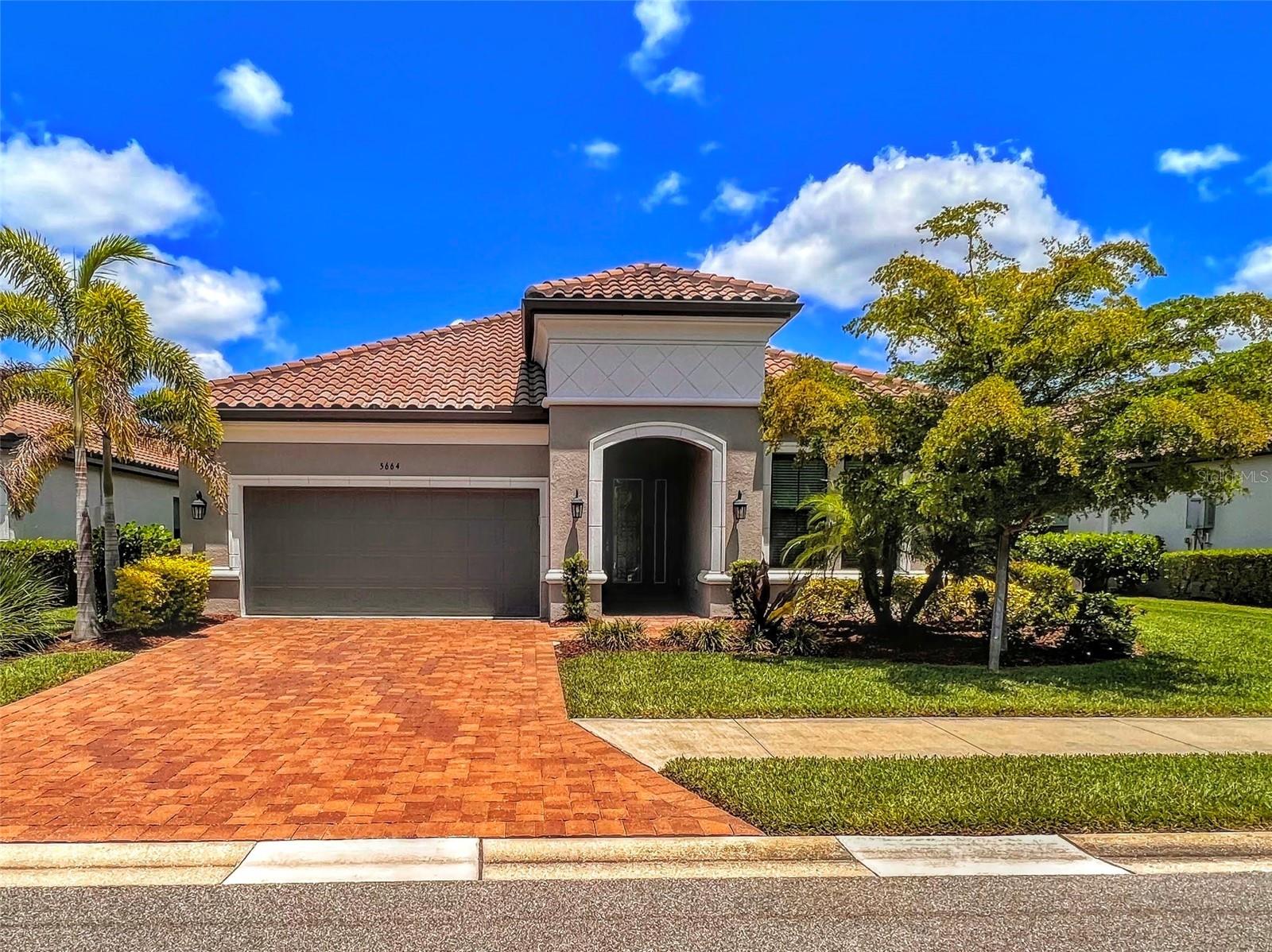 One or more photo(s) has been virtually staged. This is a beautiful 2 bedroom, 2 and a half bathroom lake view home with a den in the gated resort community of Bellacina by Casey Key! This home has a lot of upgrades including tray ceilings in the living area and master bedroom, tile in living areas, zero corner sliding doors and so much more! The chef's kitchen features a large island, tile backsplash, granite countertops, stainless-steel appliances, a natural gas cooktop, and built-in oven. The large pocket sliding doors provide plenty of natural light and open out to an extended screened-in lanai with an outdoor kitchen and direct views of the lake. The master bedroom features a large walk-in closet with custom built-in cabinetry and an ensuite bathroom with his and her sinks, a walk-in shower and a private toilet. There is another bedroom with an ensuite bathroom with a tub/shower combination. This home also includes a half guest bath, a den/office, a large laundry room and a 2 car garage. The lake view community pool and amenities are conveniently located on the same street. Bellacina resort community includes a maintenance free yard, community clubhouse & pool, kayak launch, tennis & pickleball courts, and fitness center. Located just across 41 is a Publix and Starbucks, then it's a short drive to Oscar Scherer Park, and Casey Key Beach. Motor homes, trailers, recreational vehicles, boats, campers, and commercial trucks are not allowed. Gas powered scooters, all-terrain vehicles, and other gas powered recreational vehicles are also prohibited. Please allow up to 10 days after approval before move-in for the HOA to process their own application. We score every application. If an application doesn’t score high enough, the resident may be required to place the equivalent of two months’ rent in a security deposit. Please be aware that leasing this property includes a non-optional Home Assistant Services Package that will cost an additional $30 per month. These services and their cost are separate from Tenant’s monthly rent payment and all other payments described in the Lease or any separate Lease addendums. The Home Assistant Services offered are described in the Resident Welcome Packet which can be viewed here: www.sarasotamanagement.com/home-assistant/