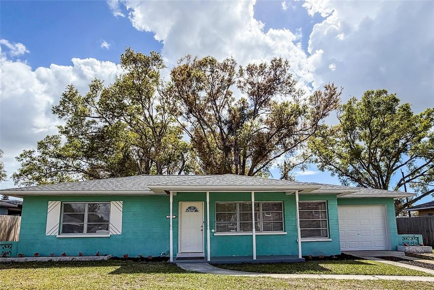 Welcome to this charming mid-century 2 bedroom, 2 full bath, 1 car garage home in the desirable Brentwood Heights subdivision of St. Petersburg, just minutes from vibrant downtown St. Pete.  This one-story property features 1,222 living sq ft (includes AC/Heated family room/rear enclosed porch), a 2023 roof, 2021 HVAC, and NEW interior paint throughout. As you enter the home, you’ll find a spacious living room with NEWLY refinished terrazzo floors throughout the home which add timeless mid-century appeal and easy-care durability.  A spacious kitchen offers NEW kitchen cabinets, NEW granite countertops, NEW stainless-steel sink with Delta faucet and soap dispenser and a NEW rolling island with 3 large drawers. The hallway full bathroom has a NEW pedestal sink, NEW tri-mirror vanity cabinet and NEW modern lighting.  The 2nd full bath (in garage) has a newer commode, sink and shower, and new vinyl tile flooring.  The large family room has brand NEW Vinyl Flooring, large jalousie windows and access to the backyard.  NEW ceiling mount dimmable lighting throughout.  The large private backyard with mature trees offers shade and privacy with a shed for additional storage.  A 1 car garage includes a NEW garage door and a separate service door providing extra convenience. Nestled in a quiet neighborhood close to shopping e.g. Mazzaro’s Italian Market, several restaurants, downtown St. Pete and the beaches.  This home combines vintage charm, updates and modern convenience — the best of St. Pete living! See the Virtual Tour:  https://www.tourfactory.com/idxr3237888