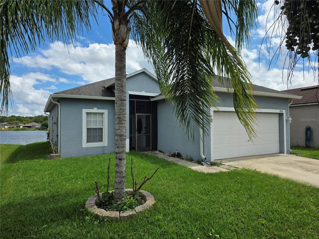 Photo of 4908 Waterside Pointe Circle, Orlando, FL 32829 (MLS # O6447441)