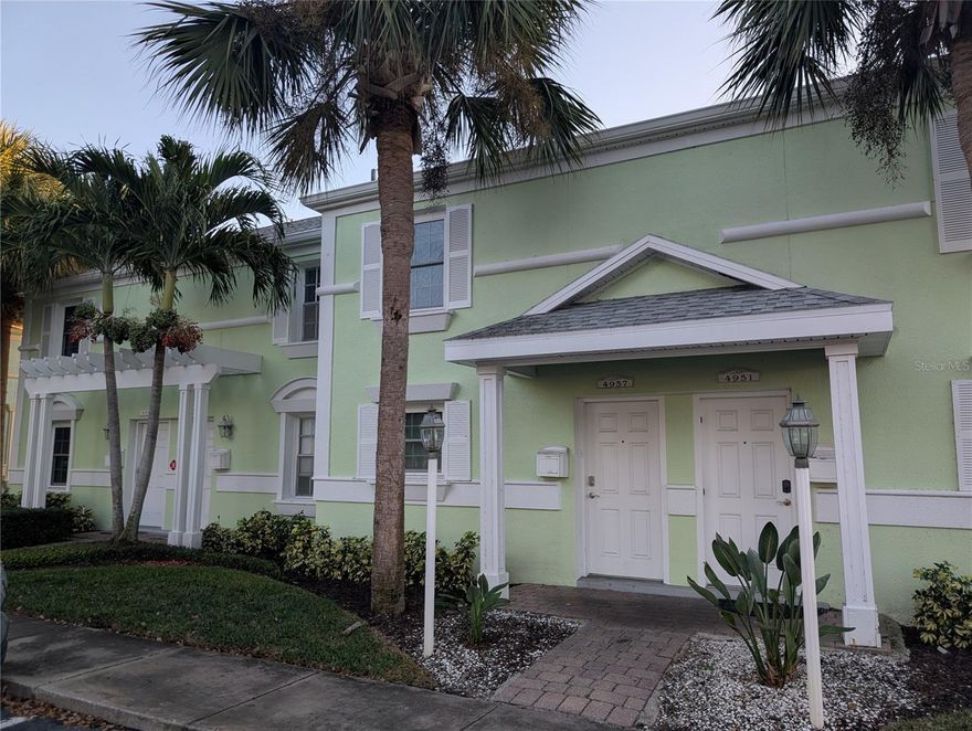 Short Sale. Step into the exclusive vibrant waterfront community of Waterside, where every day feels like a vacation. Upgrade your resort lifestyle with this 2-story, 2-bedroom, 2.5-bath home that offers 1,053 square feet of comfortable living with stunning canal views and your own deeded boat slip with a lift. Beyond the well-maintained home itself, the community is designed for leisure and connection. Enjoy sunrise and sunset views over the water, unwind at one of two sparkling pools, or gather with friends at the clubhouses and on-site bar. Stay active with tennis and pickleball courts, shuffleboard, and a playground, while your furry companions have their own dedicated dog park. Whether you’re boating from your private slip, socializing with neighbors, or simply soaking in the resort-style atmosphere, this gated community delivers the ultimate waterfront lifestyle.