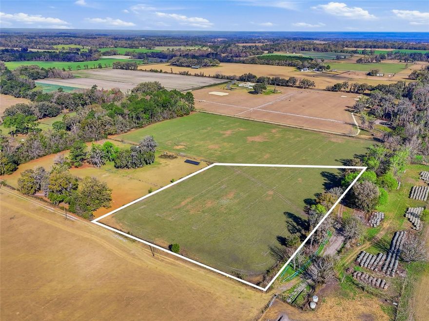 Discover a rare opportunity to own 5+ acres in beautiful Alachua, Florida, offering the perfect canvas for your forever home. Located in a peaceful farm community in North Florida, this high-and-dry, Agricultural-zoned property is thoughtfully cleared and ready for your vision. With no HOA and no deed restrictions, you’ll enjoy the flexibility and freedom to build exactly what you’ve been dreaming of. Privately tucked away for peace and seclusion, this spacious property provides the ideal setting for a custom home, small farm, homestead, or private country retreat. Surrounded by the natural beauty and quiet charm of Alachua, the property offers the tranquility of rural living while remaining conveniently close to modern amenities. Looking for even more space? Three additional adjoining parcels are also available, giving buyers the unique opportunity to purchase all four parcels together for over 20 acres, creating a private estate, family compound, or expansive farm. Enjoy the best of both worlds — serene country living just minutes from the Santa Fe River, I-75, nearby shopping, medical facilities, and an easy commute to Gainesville for work, dining, and entertainment. Opportunities like this are becoming increasingly rare — combining acreage, versatility, privacy, and convenience in one exceptional North Florida offering. Build the sanctuary you’ve always envisioned and experience the charm and tranquility that make Alachua such a special place to call home.