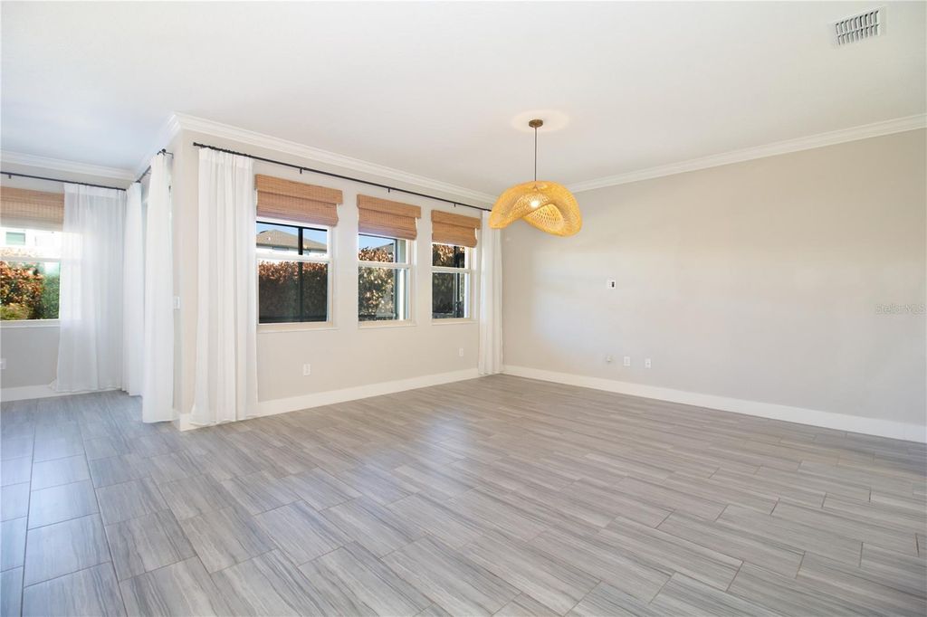 Photo of 18023 Fenders Way, Land O Lakes, FL 34638 (MLS # TB8471499)