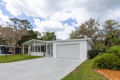 Photo of 412 Schooner Avenue, Edgewater, FL 32141 (MLS # NS1087707)