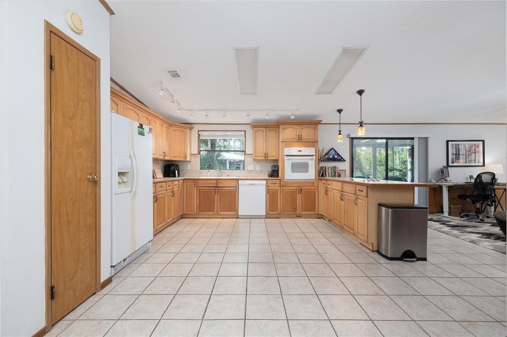 Photo of 412 Schooner Avenue, Edgewater, FL 32141 (MLS # NS1087707)