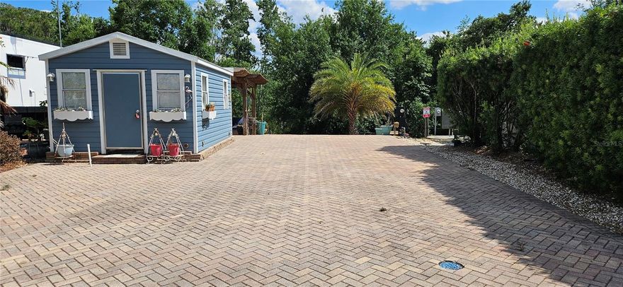 A rare Premium water view RV lot for sale or lease, which ever comes first. Rolling Ridge RV Resort is a 55+ gated community for the RV enthusiast. This 40x60 lot sits on a tranquil pond with a private shed/laundry and workshop. Fully paved with all hookups and 20/30/50 power. Besides the gated entrance, the community amenities include a heated pool, shuffleboard, tennis and pickleball courts, clubhouse with billiard room and abundant weekly activities. Low HOA dues include water and sewer. WiFi is free in the clubhouse. You can also rent your lot short term with restrictions as investment income. The lot is large enough for the biggest RV or a mobile home. Ideally located 1 mile South of the Highway 27 and Florida's Turnpike interchange, Rolling Ridge offers close proximity to Clermont and Minneola shopping, Lakeridge Winery and all the theme parks Central Florida is famous for.