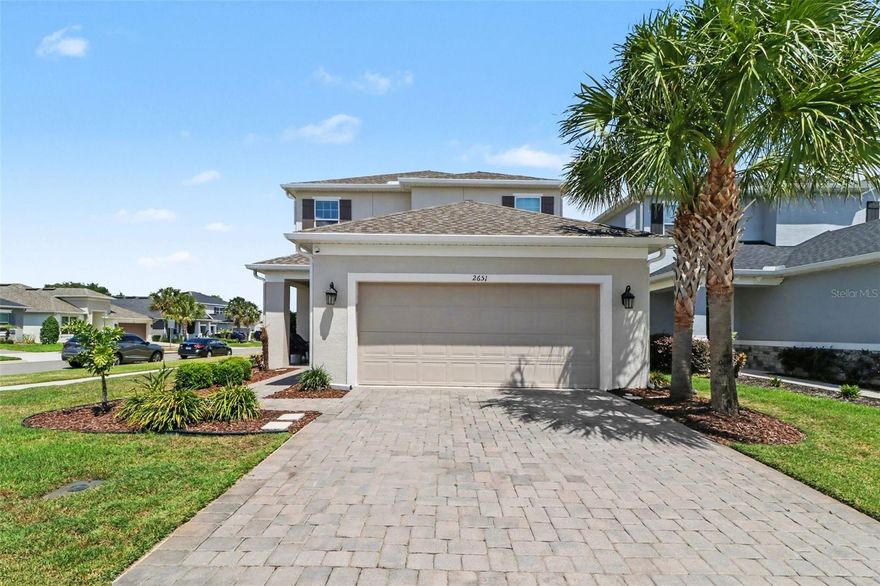Click the Virtual Tour link to view the 3D walkthrough. Located in the gated Crestview community, this beautifully designed two-story home offers an open floor plan, upscale finishes, and flexible living spaces ideal for everyday comfort and entertaining. The main living area features wood plank tile flooring, soaring ceilings, a custom dry bar with mini fridge, and a seamless flow between the living, dining, and chef’s kitchen. The kitchen is equipped with quartz countertops, a gas cooktop with designer hood, built-in microwave and wall oven, spacious pantry, and under-sink water filtration system. A convenient first-floor half bath and laundry room with cabinetry add functionality to the thoughtfully designed layout. The first-floor owner’s suite is a private retreat with a tray ceiling, custom walk-in closet with extra storage, and a spa-inspired bath featuring dual sinks and an oversized frameless glass shower. Also downstairs is a dedicated study with French doors and custom built-in cabinetry with granite countertops. Upstairs, wood spindle rail stairs lead to a loft overlooking the main living space, along with three additional bedrooms—one with a private full bath. The fourth bedroom has been transformed into a custom movie theatre complete with built-in speakers, projector, screen, and a custom walk-in closet, with the option to convert it back into a bedroom upon buyer request. Additional features include a tankless water heater, water softener, overhead garage storage racks, wall organizer systems, vinyl fencing added in 2021, and a screened porch added in 2025. The home also includes a transferable 10-year structural warranty with five years remaining and Massey termite bond that can be transferred by the buyer. Residents enjoy community amenities including a pool, tot lot, and green spaces, all conveniently located near downtown Clermont and Minneola shopping, dining, breweries, parks, lakes, and major roadways with easy 30 minute drive to Orlando, Central Florida theme parks and more. ***A DISCOUNTED INTEREST RATE AND NO LENDER FEE REFINANCING FOR LIFE AVAILABLE FOR QUALIFIED BUYERS PURCHASE THIS HOME USING AN AFFILIATE OF ORCHARD BROKERAGE, LLC! Some restrictions apply. Consult with the Listing Agent for more program details.***