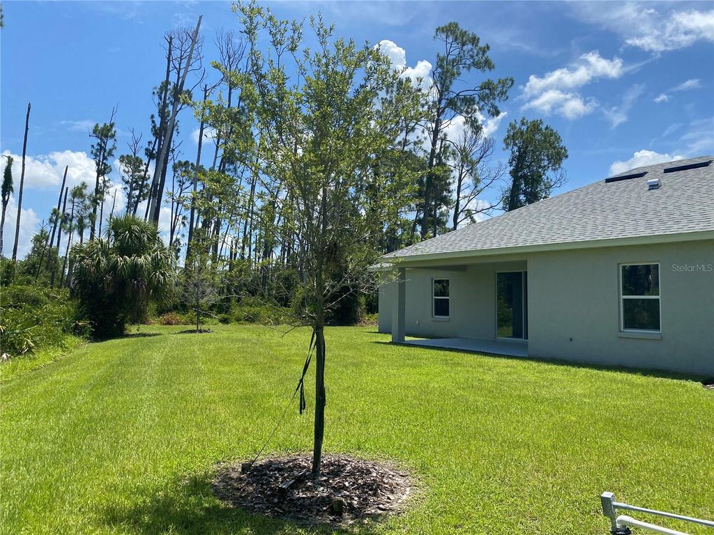 Photo of 1828 Spaniel Avenue, North Port, FL 34288 (MLS # OM690129)