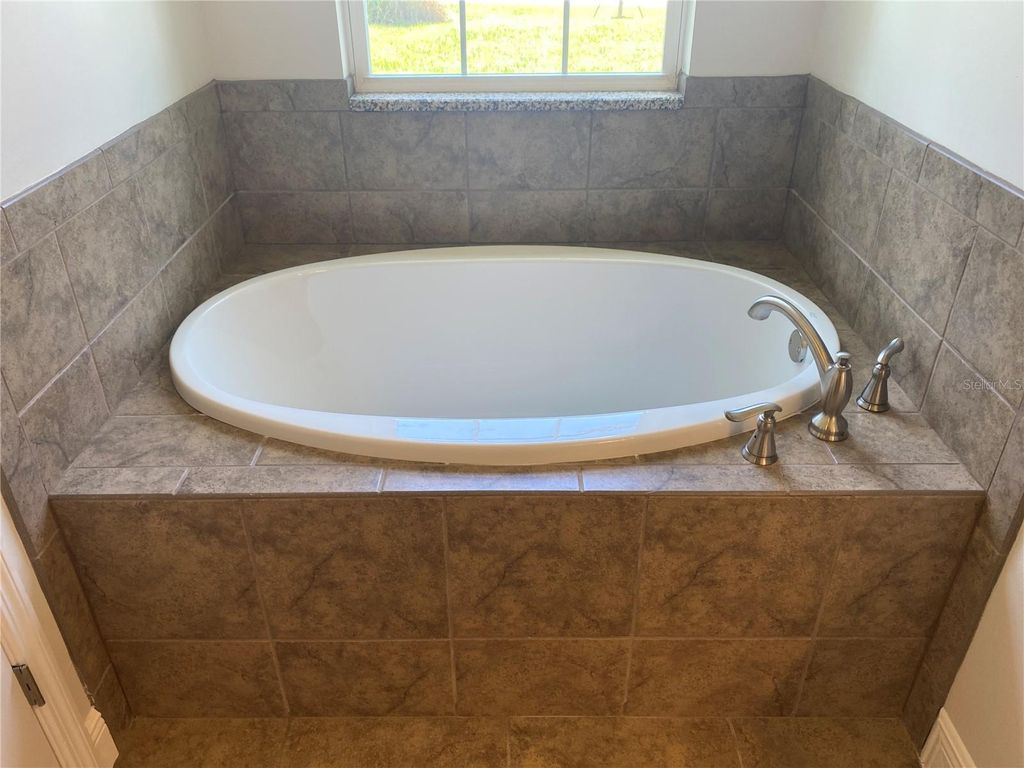 Photo of 1828 Spaniel Avenue, North Port, FL 34288 (MLS # OM690129)