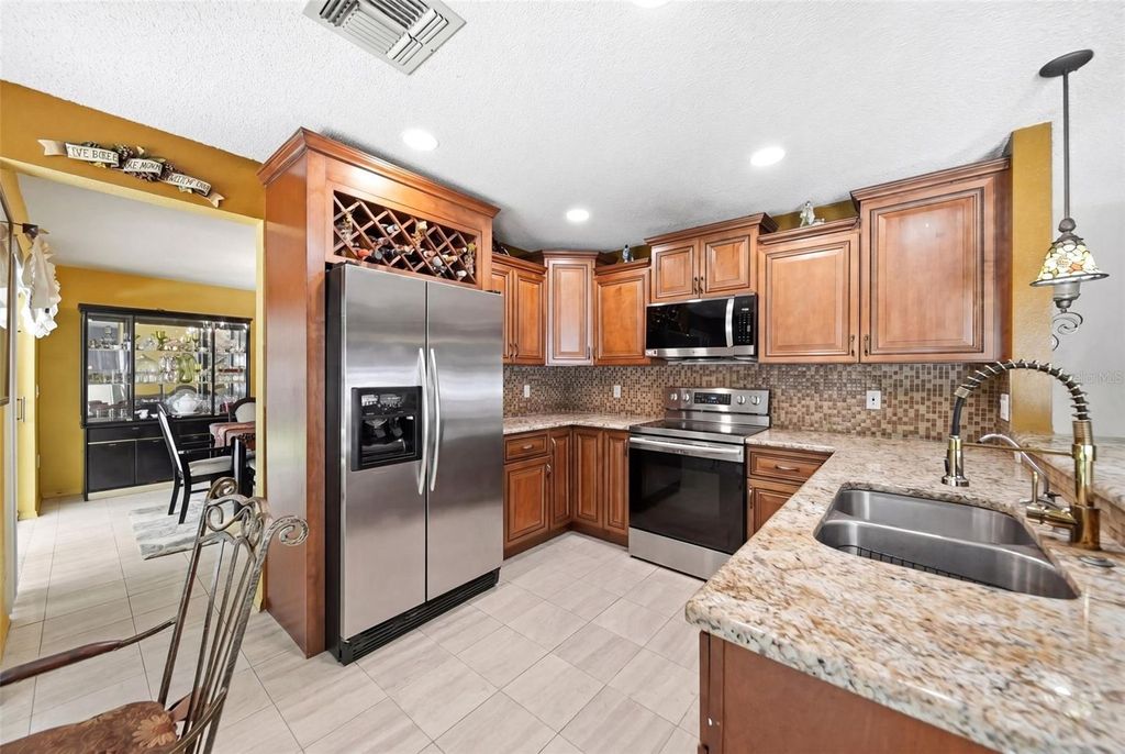 Photo of 14536 Grassy Cove Circle, Orlando, FL 32824 (MLS # O6399717)