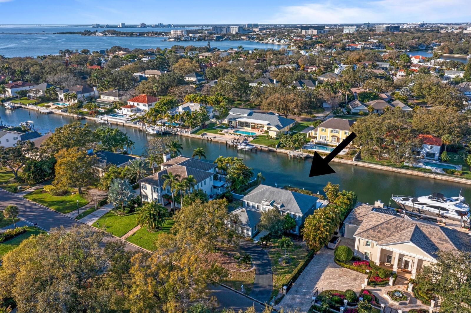 RARELY AVAILABLE waterfront property on the Grand Canal of Culbreath Isles, one of South Tampa’s most desired gated neighborhoods. Build your dream home on approximately .34 Acres and 99 feet of seawall on this deep canal location with direct access to the open waters of Tampa Bay. The deep-water canal location gives ease of access to open water and will accommodate much larger boats than typical Tampa waterfront canal properties. A dock permit may be obtained. The original two-story home is 3,172 SF with a pool area, covered porch and 2-car garage. The home features living room, dining room, family room and kitchen, along with 4 bedrooms and 3.5 baths. Culbreath Isles is located in an area of high value homes, with A-rated schools and convenience to all that Tampa Bay has to offer. Minutes to TIA, beaches, sports venues, downtown Tampa, have the very best of waterfront living. The value is primarily in the land and is one of the only available homesites on the market in the community.