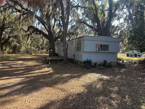 Photo of 6335 SE 159th Court, Ocklawaha, FL 32179 (MLS # OM716181)