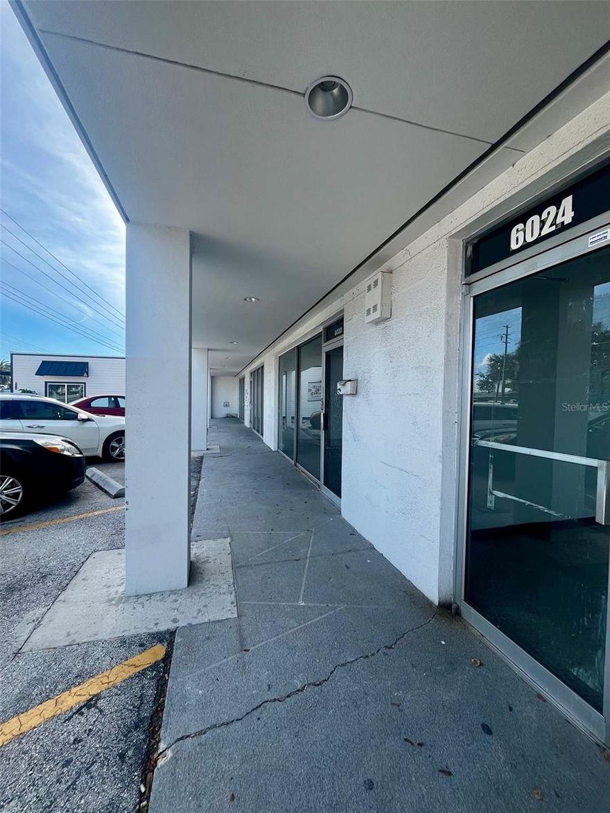 Highly Visible Retail / Office Space for Lease – 6024 Seminole Blvd, Seminole, FL Available for lease: ±1,000 SF commercial space located in a well-positioned strip center along Seminole Boulevard, a major thoroughfare with traffic counts exceeding 38,000 vehicles per day, providing excellent exposure and visibility.  The space features terrazzo flooring, a glass storefront, and a functional layout suitable for a variety of retail, service, or office users. The front of the suite includes a small work area with electrical in place for up to three workstations, while the rear offers a private office, in-suite restroom, back office area, dedicated storage room, and an additional area with a tub sink, ideal for light service or specialty uses.  Electrical and mounting infrastructure is in place for exterior signage. An optional storage shed with roll-up door is available at the rear of the property, providing added flexibility for inventory or equipment storage.
This is an excellent opportunity for users seeking a high-traffic Seminole location with strong visibility, practical buildout, and convenient access.