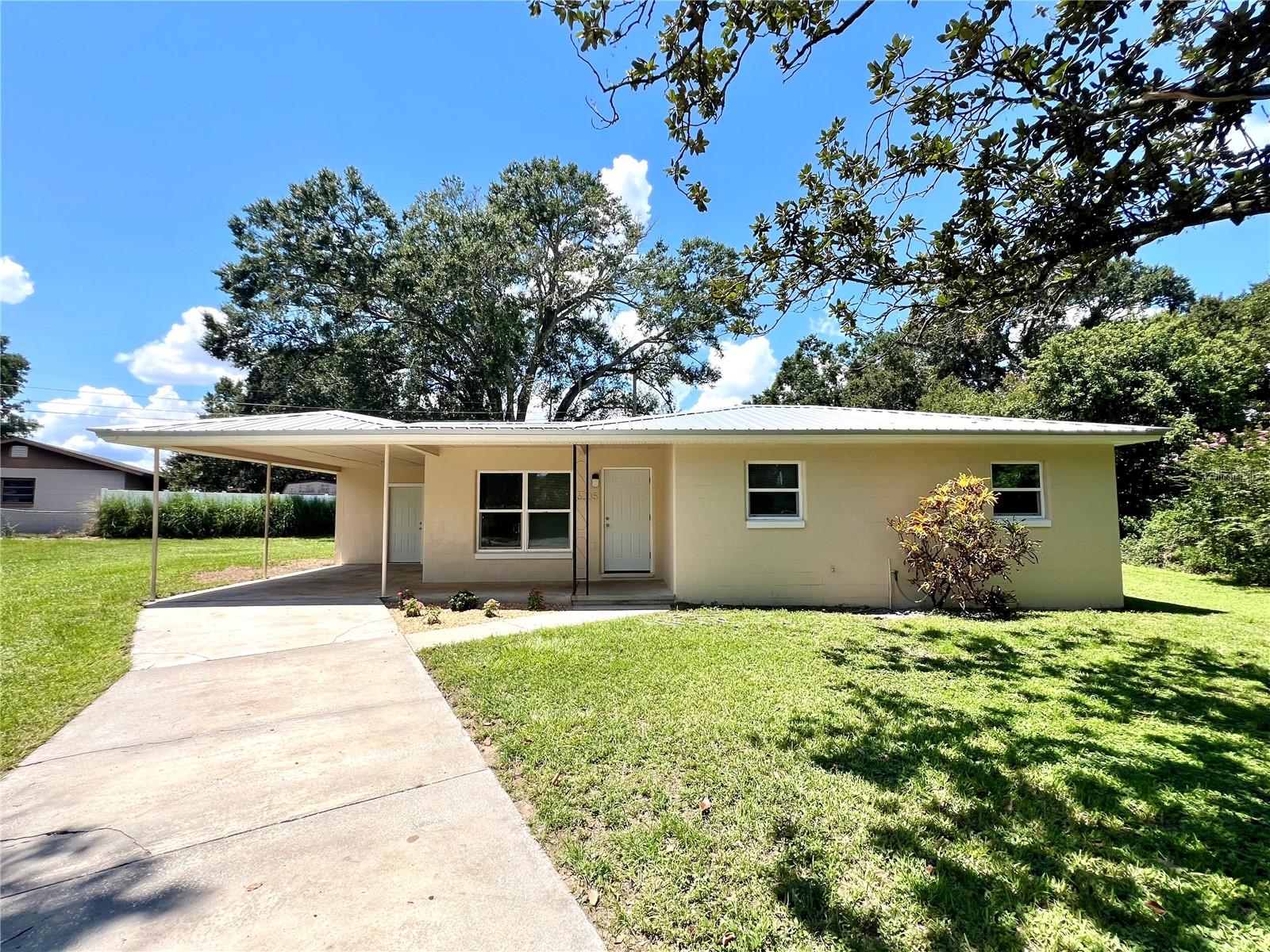 You must see this adorable 3 bedroom 1 full bath home located south Lakeland near 540A and US 98. This remodeled home boasts a 1 year old metal roof, new flooring, new windows, all new paint, new blinds, new interior and external doors, 3 year old cabinets, all new light fixtures and celling fans, all new receptacles, 2 year old appliances, 3.5 year old AC, and a 10 year old septic that was just pumped and the filter cleaned. The completely renovated bathroom has a new walk in shower, new toilet, and a new vanity. The home is located on a quiet cul-de-sac and has a large backyard. The property is conveniently located to many shopping centers, parks, grocery stores, and the Polk Parkway for easy commutes to Orlando and Tampa. You must see this home in person to truly appreciate. Set up your showing today before it is gone!