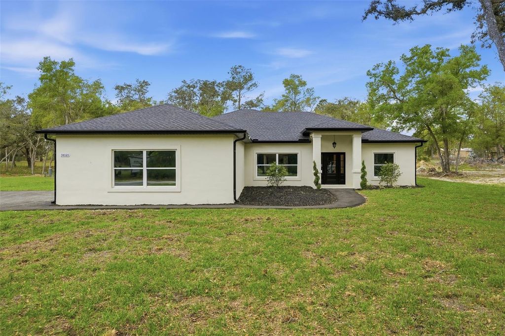 Photo of 34121 August Avenue, Webster, FL 33597 (MLS # W7884432)