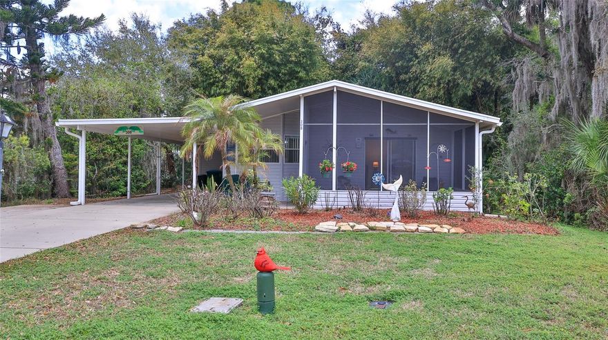 Welcome to this charming 2-bedroom, 2-bath home nestled on a beautiful greenbelt lot perfectly tucked away in a quiet cul-de-sac. Relax on the front screened patio while enjoying  your morning coffee or watching the birds and squirrels. Inside, the home features fresh paint throughout, new vinyl plank flooring in the entry, living room, dining area, and hallway, along with new carpet in the bedrooms. Vaulted ceilings enhance the spacious feel, creating a bright and inviting atmosphere. Solar panels help keep utility costs low, adding both efficiency and value. Furnishing are negotiable. Located in the desirable gated community of Lighthouse Cove, where golf carts are a popular second mode of transportation. These include a large heated swimming pool, a recently renovated clubhouse, pickleball courts, shuffleboard, and a scenic picnic area along the river. Boating enthusiasts will appreciate the private boat launch for shallow water vessels, as well as a fishing pier—perfect for casting a line or even watching rocket launches nearby. Ideally situated just a short distance from the Mosquito Lagoon, this home offers a true boating, fishing, and shrimping paradise. This home will not last long. Don’t miss your chance to own a slice of paradise. All measurements are approximate. Information deemed reliable but not guaranteed.