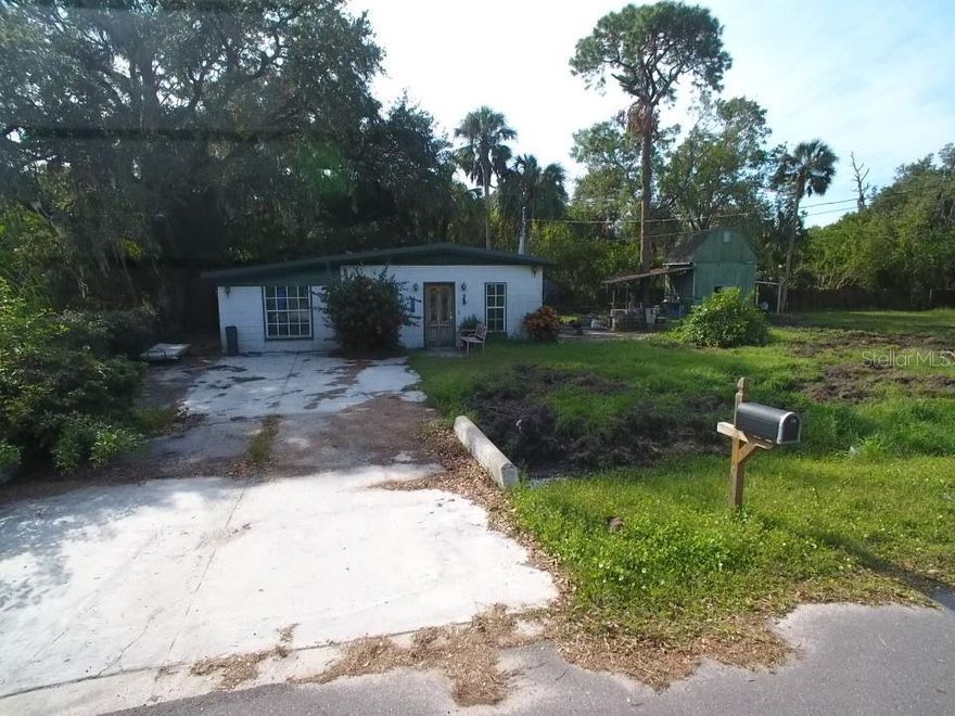 Rare waterfront opportunity on Dug Creek! 1bed/1 bath needs renovation and a lot of TLC. oversized lot. Dock on the property. Creek leads directly into the Gulf of Mexico. Ideal to construct your new dream home on. Construction of a 2nd structure on the property was started but wasn't completed. Concrete block slab foundation is laid. Ready to be turned into a 2nd single family residence or a garage/workshop. Potentially sub dividable into two residential properties or could be rezoned to commercial, also - buyer to verify this. Property is located at the end of a dead end road. Dead end road features a small vessel ramp access into Dug Creek and is a straight shot into the Bay. Do not miss this opportunity.