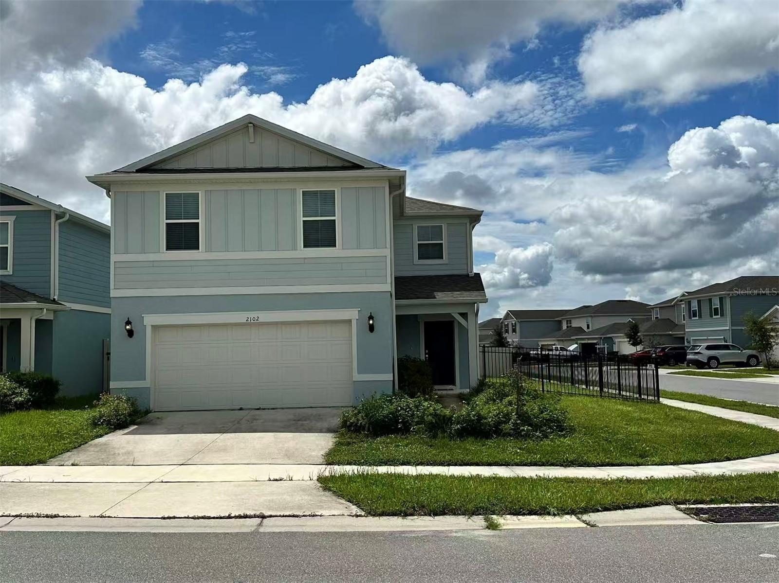 Like-new stunning single family home located in the highly desired community of Belle Haven. The community is just minutes from Hwy-27, I-4, SR-429, theme parks and the 80-acre open-air shopping, dining and entertainment center of Posner Park. On-site amenities include a community pool with cabana, open green spaces and a community playground. Spectrum gigabit high-speed internet and TV are included in the HOA fees and there is no CDD. Listing photos are staged from the model home. This beautiful home nestled on a desirable corner homesite, offering a seamless living experience that makes everyday life easier and more enjoyable. With 5 spacious bedrooms, 3 luxurious bathrooms, a loft, and a 2-car garage, this home provides abundant space for all your needs. Step inside to be greeted by a stunning foyer with a graceful wrap-around staircase. Just beyond, the open-concept kitchen flows seamlessly into the café and gathering room, creating an ideal space for both relaxation and entertaining. The kitchen boasts a large center island, a storage pantry, and Whirlpool stainless-steel appliances, For added convenience, a bedroom and full bathroom are located on the main level—ideal for guests or as a private office space. Upstairs, the Talon home continues to impress with a spacious loft, a well-appointed laundry room – including washer and dryer, the spacious Owner’s Suite, and three additional bedrooms. The Owner’s Suite is a true retreat, featuring a large walk-in closet, an en suite bath with a double quartz-topped vanity, a linen closet, and a glass-enclosed shower. Every aspect of this home has been designed with quality in mind, from the beautiful tile flooring throughout the first-floor living areas to the soft, stain-resistant Ornamental Gate carpeting in the bedrooms and second floor. With its combination of luxurious finishes, thoughtful design, and exceptional convenience, this beautiful home offers the ideal space to enjoy both daily living and special moments. Call for a showing today!
