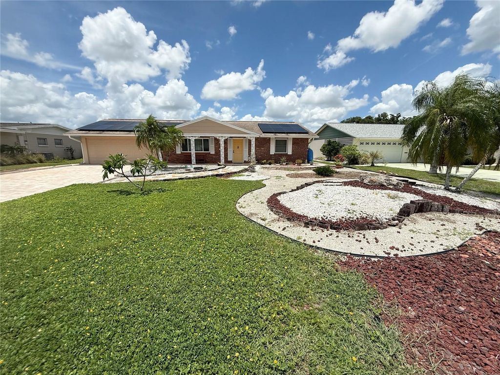 Photo of 1606 N Pebble Beach Boulevard, Sun City Center, FL 33573 (MLS # O6328493)